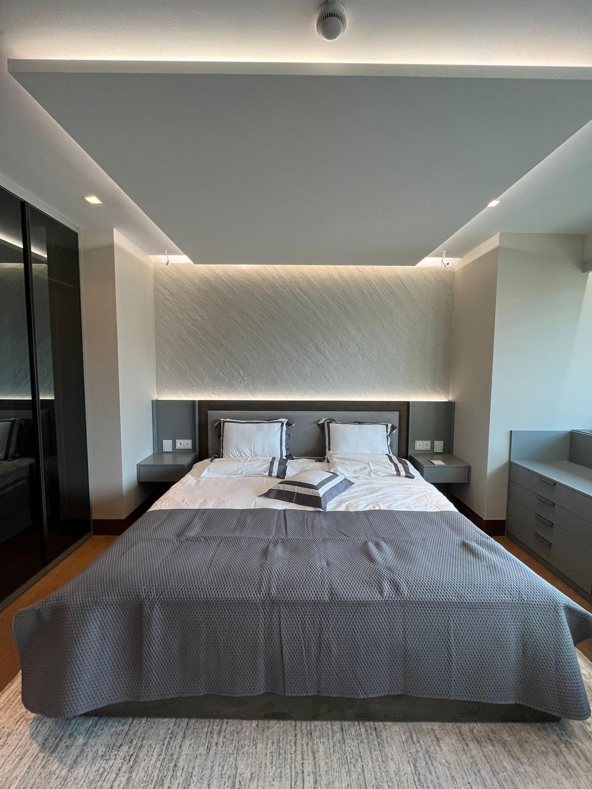 Built-in headboard with floating nightstands